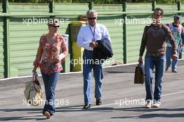 23.04.2006 Imola, Italy,  Corina Schumacher (GER), Corinna, Wife of Michael Schumacher arrives at the circuit with her left arm and hand in a bandage with Willi Weber (GER), Driver Manager and Michael Schumacher (GER), Scuderia Ferrari - Formula 1 World Championship, Rd 4, San Marino Grand Prix, Sunday