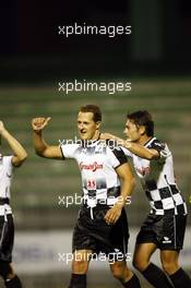 06.09.2006 Monza, Italy, Michael Schumacher (GER), Scuderia Ferrari and Giancarlo Fisichella (ITA), Renault F1 Team - National Drivers Charity football match at "Stadio Brianteo Stadio Brianteo", Formula 1 World Championship, ITA, Italy