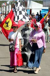 25.08.2006 Istanbul, Turkey,  Ferrari fan and women wearing scarfs - Formula 1 World Championship, Rd 14, Turkish Grand Prix, Friday