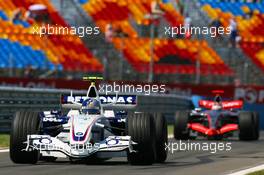 25.08.2006 Istanbul, Turkey,  Sebastian Vettel (GER), Test Driver, BMW Sauber F1 Team, F1.06 and Kimi Raikkonen (FIN), Räikkönen, McLaren Mercedes, MP4-21 - Formula 1 World Championship, Rd 14, Turkish Grand Prix, Friday Practice