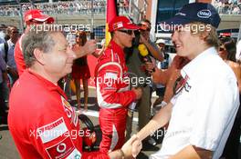 27.08.2006 Istanbul, Turkey,  Jean Todt (FRA), Scuderia Ferrari, Teamchief, General Manager, Team Principal meets Sebastian Vettel (GER), Test Driver, BMW Sauber F1 Team - Formula 1 World Championship, Rd 14, Turkish Grand Prix, Sunday Pre-Race Grid