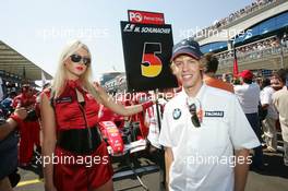 27.08.2006 Istanbul, Turkey,  Sebastian Vettel (GER), Test Driver, BMW Sauber F1 Team with a grid girl - Formula 1 World Championship, Rd 14, Turkish Grand Prix, Sunday Pre-Race Grid