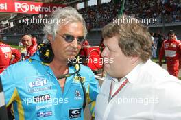 27.08.2006 Istanbul, Turkey,  Flavio Briatore (ITA), Renault F1 Team, Team Chief, Managing Director and Norbert Haug (GER), Mercedes, Motorsport chief - Formula 1 World Championship, Rd 14, Turkish Grand Prix, Sunday Pre-Race Grid