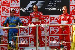 27.08.2006 Istanbul, Turkey,  Winner, Felipe Massa (BRA), Scuderia Ferrari, 2nd Fernando Alonso (ESP), Renault F1 Team, 3rd, Michael Schumacher (GER), Scuderia Ferrari - Formula 1 World Championship, Rd 14, Turkish Grand Prix, Sunday Podium