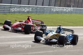 27.08.2006 Istanbul, Turkey,  Fernando Alonso (ESP), Renault F1 Team and Michael Schumacher (GER), Scuderia Ferrari - Formula 1 World Championship, Rd 14, Turkish Grand Prix, Sunday Podium