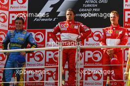 27.08.2006 Istanbul, Turkey,  Winner, Felipe Massa (BRA), Scuderia Ferrari, 2nd Fernando Alonso (ESP), Renault F1 Team, 3rd, Michael Schumacher (GER), Scuderia Ferrari - Formula 1 World Championship, Rd 14, Turkish Grand Prix, Sunday Podium