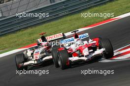 27.08.2006 Istanbul, Turkey,  Jarno Trulli (ITA), Toyota Racing, TF106 and Rubens Barrichello (BRA), Honda Racing F1 Team, RA106  - Formula 1 World Championship, Rd 14, Turkish Grand Prix, Sunday Race