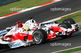 27.08.2006 Istanbul, Turkey,  Ralf Schumacher (GER), Toyota Racing, TF106 and Robert Kubica (POL), BMW Sauber F1 Team, F1.06 - Formula 1 World Championship, Rd 14, Turkish Grand Prix, Sunday Race