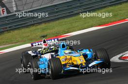 27.08.2006 Istanbul, Turkey,  Giancarlo Fisichella (ITA), Renault F1 Team, R26 and Robert Kubica (POL), BMW Sauber F1 Team, F1.06 - Formula 1 World Championship, Rd 14, Turkish Grand Prix, Sunday Race