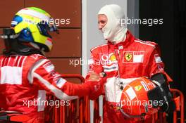 26.08.2006 Istanbul, Turkey,  Michael Schumacher (GER), Scuderia Ferrari congratulates Felipe Massa (BRA), Scuderia Ferrari on his pole position - Formula 1 World Championship, Rd 14, Turkish Grand Prix, Saturday Qualifying