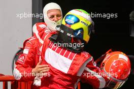 26.08.2006 Istanbul, Turkey,  Michael Schumacher (GER), Scuderia Ferrari congratulates Felipe Massa (BRA), Scuderia Ferrari on his pole position - Formula 1 World Championship, Rd 14, Turkish Grand Prix, Saturday Qualifying