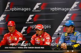 26.08.2006 Istanbul, Turkey,  Felipe Massa (BRA), Scuderia Ferrari, Michael Schumacher (GER), Scuderia Ferrari and Fernando Alonso (ESP), Renault F1 Team  - Formula 1 World Championship, Rd 14, Turkish Grand Prix, Saturday Press Conference