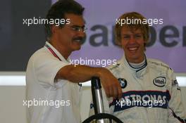 24.08.2006 Istanbul, Turkey,  Dr. Mario Theissen (GER), BMW Sauber F1 Team, BMW Motorsport Director with Sebastian Vettel (GER), Test Driver, BMW Sauber F1 Team - Formula 1 World Championship, Rd 14, Turkish Grand Prix, Thursday