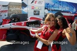 23.08.2006 Istanbul, Turkey,  Girls pose in front of dummy of a racing car in downtown Istanbul - Formula 1 World Championship, Rd 14, Turkish Grand Prix, Wednesday