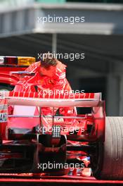 30.06.2006 Indianapolis, USA,  Michael Schumacher (GER), Scuderia Ferrari stopped in a gravel trap and was taken back to the pits on a truck - Formula 1 World Championship, Rd 10, United States Grand Prix, Friday Practice
