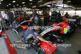 30.06.2006 Indianapolis, USA,  Midland MF1 Racing team prepare cars for the session - Formula 1 World Championship, Rd 10, United States Grand Prix, Friday Practice