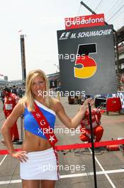 02.07.2006 Indianapolis, USA,  Michael Schumacher (GER), Scuderia Ferrari, grid girl - Formula 1 World Championship, Rd 10, United States Grand Prix, Sunday Pre-Race Grid