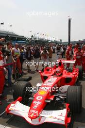 02.07.2006 Indianapolis, USA,  Michael Schumacher (GER), Scuderia Ferrari, 248 F1 - Formula 1 World Championship, Rd 10, United States Grand Prix, Sunday Pre-Race Grid