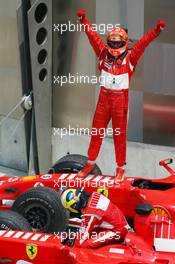 02.07.2006 Indianapolis, USA,  1st Place, Michael Schumacher (GER), Scuderia Ferrari, 248 F1, 2nd place Felipe Massa (BRA), Scuderia Ferrari, 248 F1, 3rd place Giancarlo Fisichella (ITA), Renault F1 Team, R26 - Formula 1 World Championship, Rd 10, United States Grand Prix, Sunday Podium