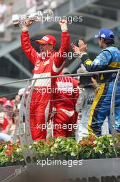 02.07.2006 Indianapolis, USA,  1st Place, Michael Schumacher (GER), Scuderia Ferrari, 248 F1, 2nd place Felipe Massa (BRA), Scuderia Ferrari, 248 F1, 3rd place Giancarlo Fisichella (ITA), Renault F1 Team, R26 - Formula 1 World Championship, Rd 10, United States Grand Prix, Sunday Podium