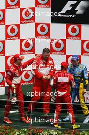 02.07.2006 Indianapolis, USA,  1st Place, Michael Schumacher (GER), Scuderia Ferrari, 248 F1, 2nd place Felipe Massa (BRA), Scuderia Ferrari, 248 F1, 3rd place Giancarlo Fisichella (ITA), Renault F1 Team, R26 - Formula 1 World Championship, Rd 10, United States Grand Prix, Sunday Podium