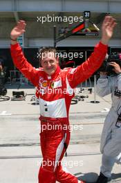 01.07.2006 Indianapolis, USA,  Michael Schumacher (GER), Scuderia Ferrari gets pole position - Formula 1 World Championship, Rd 10, United States Grand Prix, Saturday Qualifying