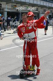 01.07.2006 Indianapolis, USA,  Michael Schumacher (GER), Scuderia Ferrari gets pole position and Felipe Massa (BRA), Scuderia Ferrari 2nd - Formula 1 World Championship, Rd 10, United States Grand Prix, Saturday Qualifying