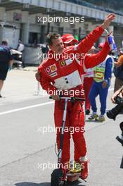 01.07.2006 Indianapolis, USA,  Michael Schumacher (GER), Scuderia Ferrari gets pole position and Felipe Massa (BRA), Scuderia Ferrari 2nd - Formula 1 World Championship, Rd 10, United States Grand Prix, Saturday Qualifying