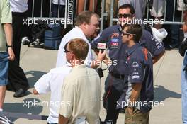 29.06.2006 Indianapolis, USA,  Tiago Monteiro (POR), Midland MF1 Racing is interviewed by EPSN - Formula 1 World Championship, Rd 10, United States Grand Prix, Thursday