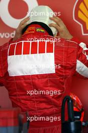 01.02.2006 Valencia, Spain,  Michael Schumacher (GER), Scuderia Ferrari ist testing some new "ear protections" under his helmet -  Formula One Testing, Circuito Ricardo Tormo (ESP)