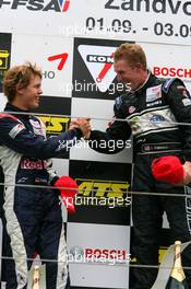 03.09.2006 Zandvoort, The Netherlands,  Sebastian Vettel (GER), ASM Formula 3, Dallara F305 Mercedes (2nd, left), congratulates ;Charlie Kimball (USA), Signature-Plus, Dallara F306 Mercedes (1st, right), with his victory - F3 Euro Series 2006 at Zandvoort, The Netherlands