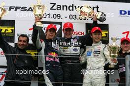 03.09.2006 Zandvoort, The Netherlands,  Podium, Charlie Kimball (USA), Signature-Plus, Dallara F306 Mercedes (1st, center), Sebastian Vettel (GER), ASM Formula 3, Dallara F305 Mercedes (2nd, left) and Kohei Hirate (JPN), Manor Motorsport, Dallara F305 Mercedes (3rd, right) - F3 Euro Series 2006 at Zandvoort, The Netherlands