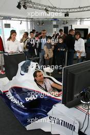 25.11.2006 Valencia, Spain, Saturday, DELL Marquee with BMW Sauber F1 Simulators - DELL Formula BMW World Final 2006, 23th - 26th November, Circuit de la Comunitat Valenciana Ricardo Tormo - For further information please register at www.formulabmwworldfinal-images.com - This image is free for editorial use only. Please use for Copyright/Credit: c BMW AG