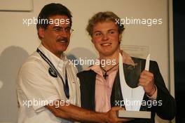 26.11.2006 Valencia, Spain, Sunday, Prize Giving Ceremony, Dr. Mario Theissen (GER), BMW Motorsport Director and Mika Mäki (FIN), Maki, Eifelland Racing - DELL Formula BMW World Final 2006, 23th - 26th November, Circuit de la Comunitat Valenciana Ricardo Tormo - For further information please register at www.formulabmwworldfinal-images.com - This image is free for editorial use only. Please use for Copyright/Credit: c BMW AG