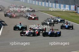 10-11.06.2006 Silverstone, England,  Lewis Hamilton (GBR), ART Grand Prix and Adam Carroll (GBR), Racing Engineering at the start of race 1 - GP2 Championship