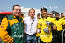 28.04.2007 Fawkham, England,  Alan Jones, Seatholder of A1Team Australia and Martin Brundle awarding the BRDC Bruce McLaren Trophy to Alex Yoong, Driver of A1Team Malaysia - A1GP World Cup of Motorsport 2006/07, Round 11, Brands Hatch, Saturday - Copyright A1GP - Free for editorial usage