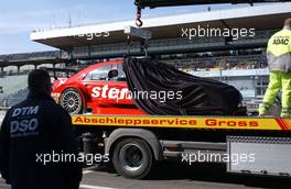 22.04.2007 Hockenheim, Germany,  During the warm up session in the morning the left front tyre seperated from the car of Alexandros Margaritis (GRC), Persson Motorsport AMG Mercedes, AMG Mercedes C-Klasse. Here the car is being returned to the team by a truck - DTM 2007 at Hockenheimring (Deutsche Tourenwagen Masters)