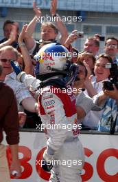22.04.2007 Hockenheim, Germany,  The winner, Mattias Ekström (SWE), Audi Sport Team Abt Sportsline, Audi A4 DTM, came into the parc fermé with a lot of smoke and weelspin out of joy. He was greeted by Martin Tomczyk (GER), Audi Sport Team Abt Sportsline, Audi A4 DTM, Dr. Wolfgang Ullrich (GER), Audi's Head of Sport and his Audi team. - DTM 2007 at Hockenheimring (Deutsche Tourenwagen Masters)