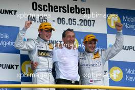 06.05.2007 Oschersleben, Germany,  Podium, a 1-2 victory for Persson Motorsport, with Gary Paffett (GBR), Persson Motorsport AMG Mercedes, Portrait (1st, right), Paul di Resta (GBR), Persson Motorsport AMG Mercedes, Portrait (2nd, left). Center: Ingmar Persson (SWE), Team Owner Persson Motorsport - DTM 2007 at Motorsport Arena Oschersleben (Deutsche Tourenwagen Masters)