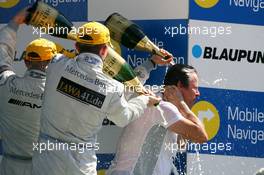 20.05.2007 Klettwitz, Germany,  Podium, Gerhard Ungar (GER), Chief Designer AMG, gets a champaign shower - DTM 2007 at Eurospeedway Lausitz (Lausitzring)