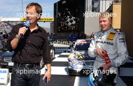 20.05.2007 Klettwitz, Germany,  Mika Häkkinen (FIN), Team HWA AMG Mercedes, AMG Mercedes C-Klasse and TV host Claus Lufen. - DTM 2007 at Eurospeedway Lausitz (Lausitzring)