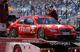 20.05.2007 Klettwitz, Germany,  The damaged car of Alexandros Margaritis (GRC), Persson Motorsport AMG Mercedes, AMG Mercedes C-Klasse is being offloaded from the truck. - DTM 2007 at Eurospeedway Lausitz (Lausitzring)