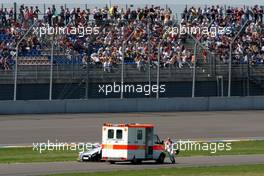 20.05.2007 Klettwitz, Germany,  After his shunt Alexandre Premat (FRA), Audi Sport Team Phoenix, Audi A4 DTM is being picked up by an ambulance. - DTM 2007 at Eurospeedway Lausitz (Lausitzring)