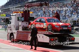 20.05.2007 Klettwitz, Germany,  The damaged car of Alexandros Margaritis (GRC), Persson Motorsport AMG Mercedes, AMG Mercedes C-Klasse is being offloaded from the truck. - DTM 2007 at Eurospeedway Lausitz (Lausitzring)