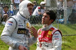 10.06.2007 Fawkham, England,  Paul di Resta (GBR), Persson Motorsport AMG Mercedes, Portrait (left) and Mike Rockenfeller (GER), Audi Sport Team Rosberg, Portrait (right), chatting about what happened during the crash at Druifs during the opening lap - DTM 2007 at Brands Hatch