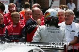 10.06.2007 Fawkham, England,  Dr. Wolfgang Ullrich (GER), Audi's Head of Sport, congratulates Bernd Schneider (GER), Team HWA AMG Mercedes, with his victory - DTM 2007 at Brands Hatch