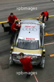 22.06.2007 Nürnberg, Germany,  Audi mechanics pull the car of Alexandre Premat (FRA), Audi Sport Team Phoenix, Audi A4 DTM, back into the pits - DTM 2007 at Norisring