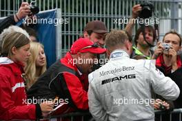 23.06.2007 Nürnberg, Germany,  Mika Häkkinen (FIN), Team HWA AMG Mercedes, Portrait (2nd), signing autographs for the fans - DTM 2007 at Norisring