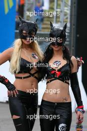23.06.2007 Nürnberg, Germany,  Promotion girls of the Cat Racing Team in rather unconventional clothing walking through the pitlane - DTM 2007 at Norisring