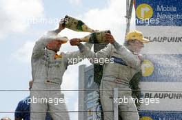 24.06.2007 Nürnberg, Germany,  Podium, champaign for Bruno Spengler (CDN), Team HWA AMG Mercedes, Portrait (1st, right) and Bernd Schneider (GER), Team HWA AMG Mercedes, Portrait (2nd, left) - DTM 2007 at Norisring